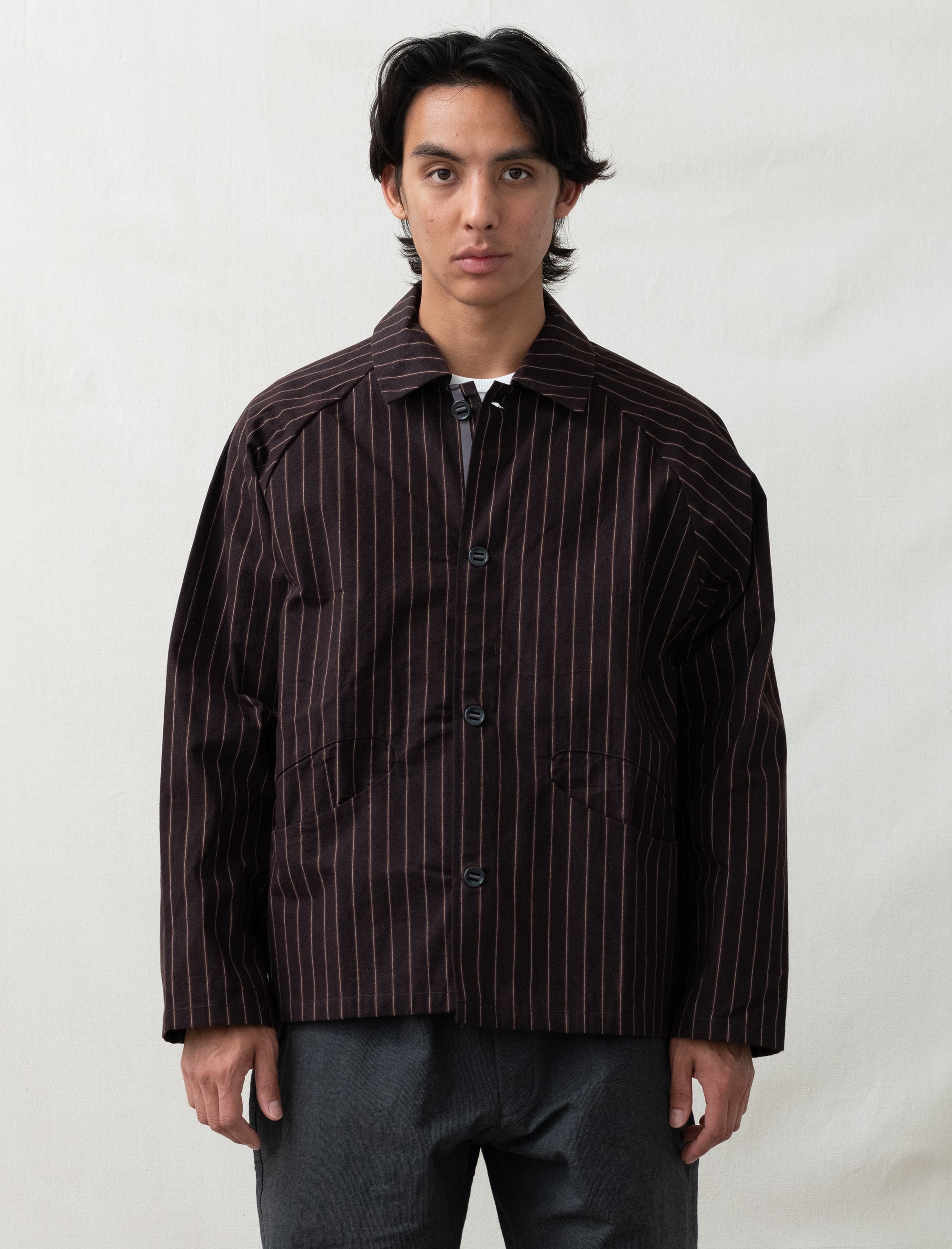 striped jacket on person 