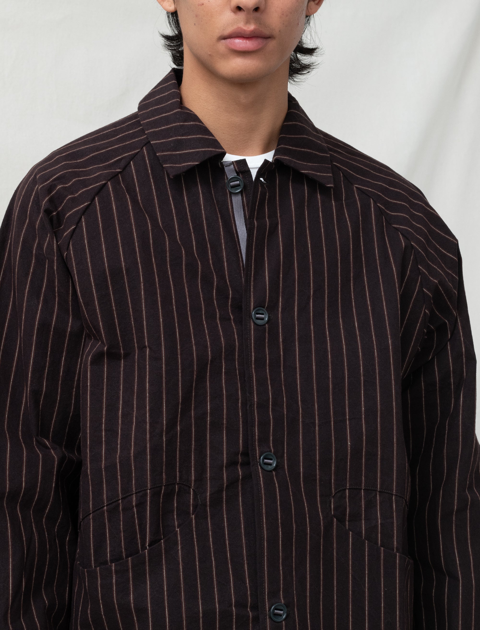 striped jacket on person 