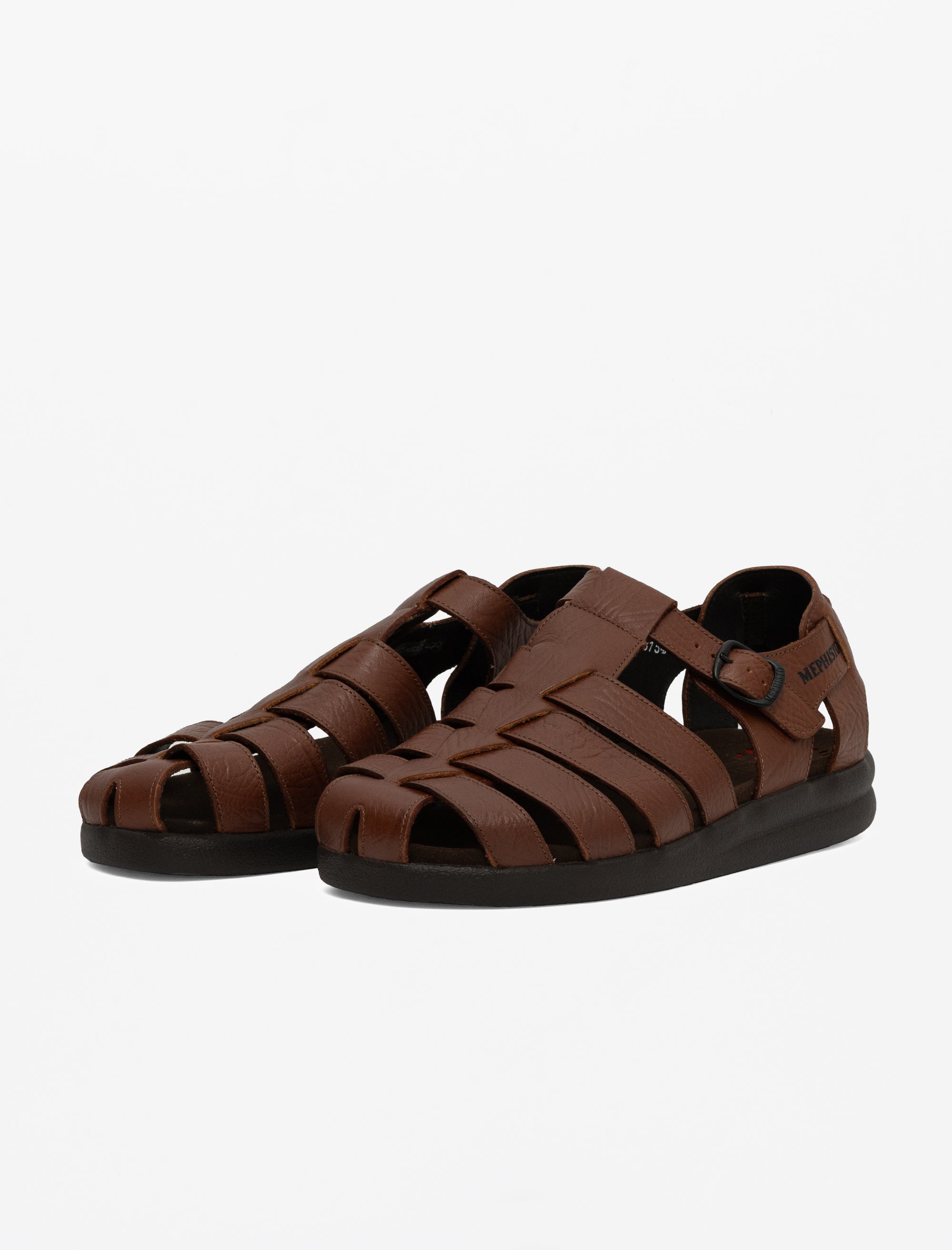 Pair of brown sandals on a white background