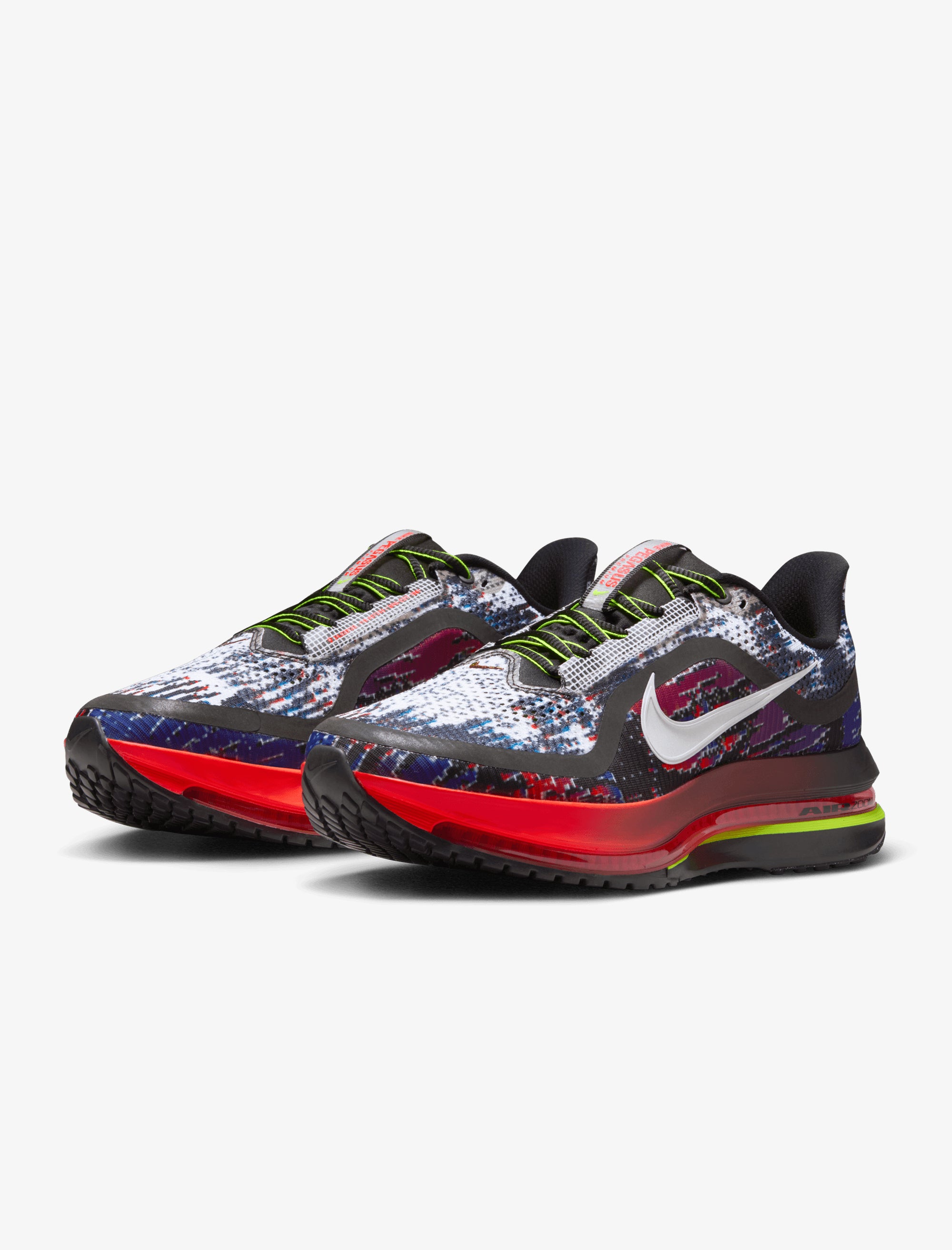 Multicolored athletic shoes with a prominent Nike logo on a white background