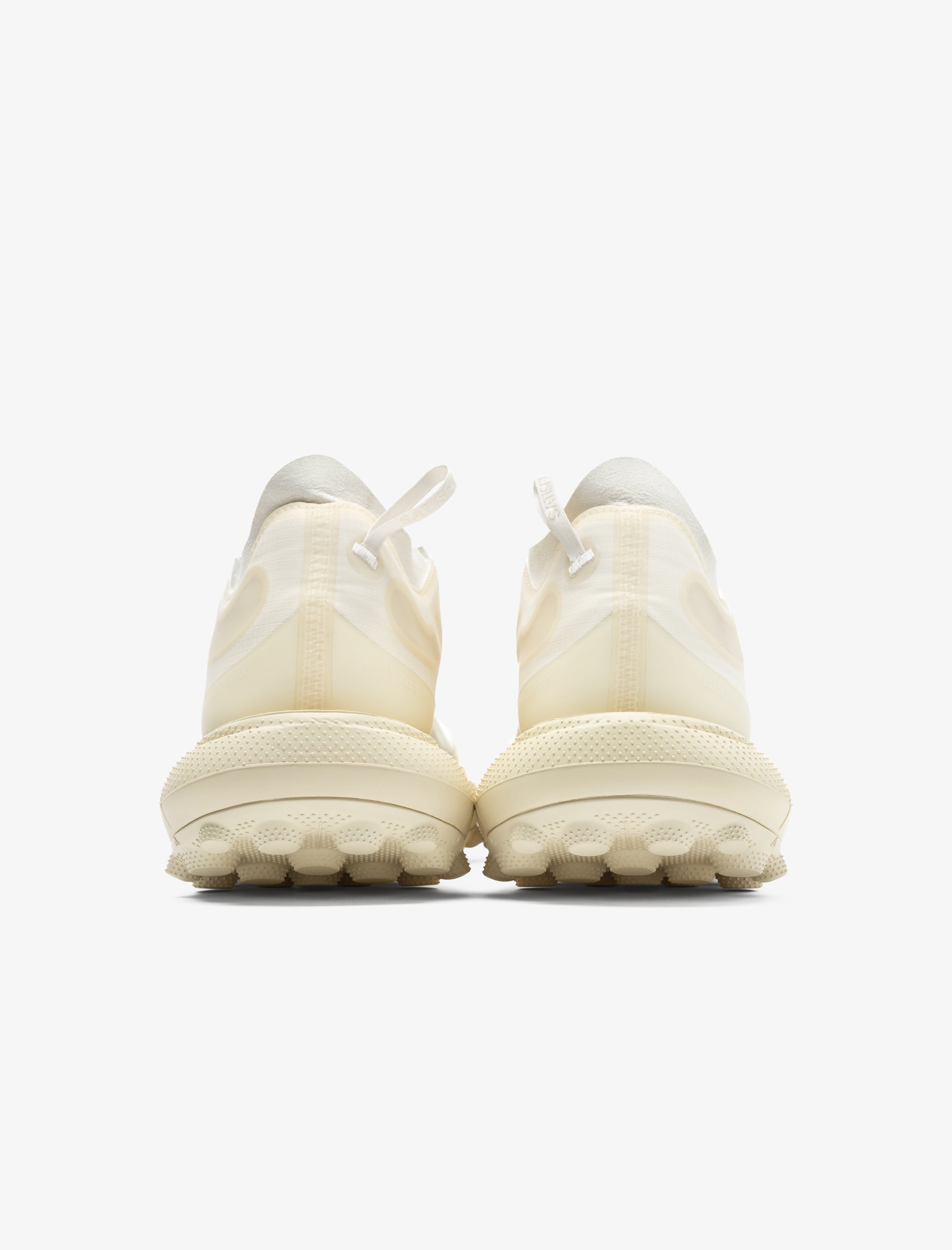 Pair of white sneakers on a white background