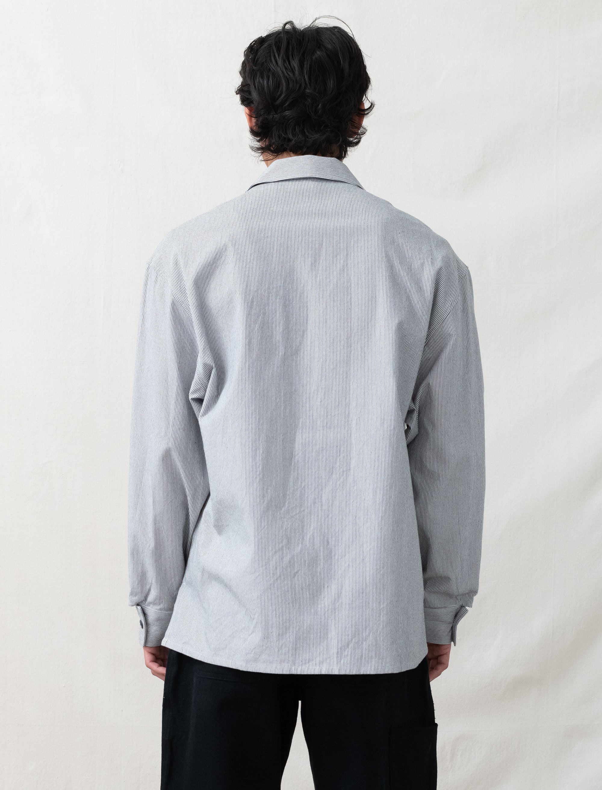 model wearing man-tle striped overshirt 