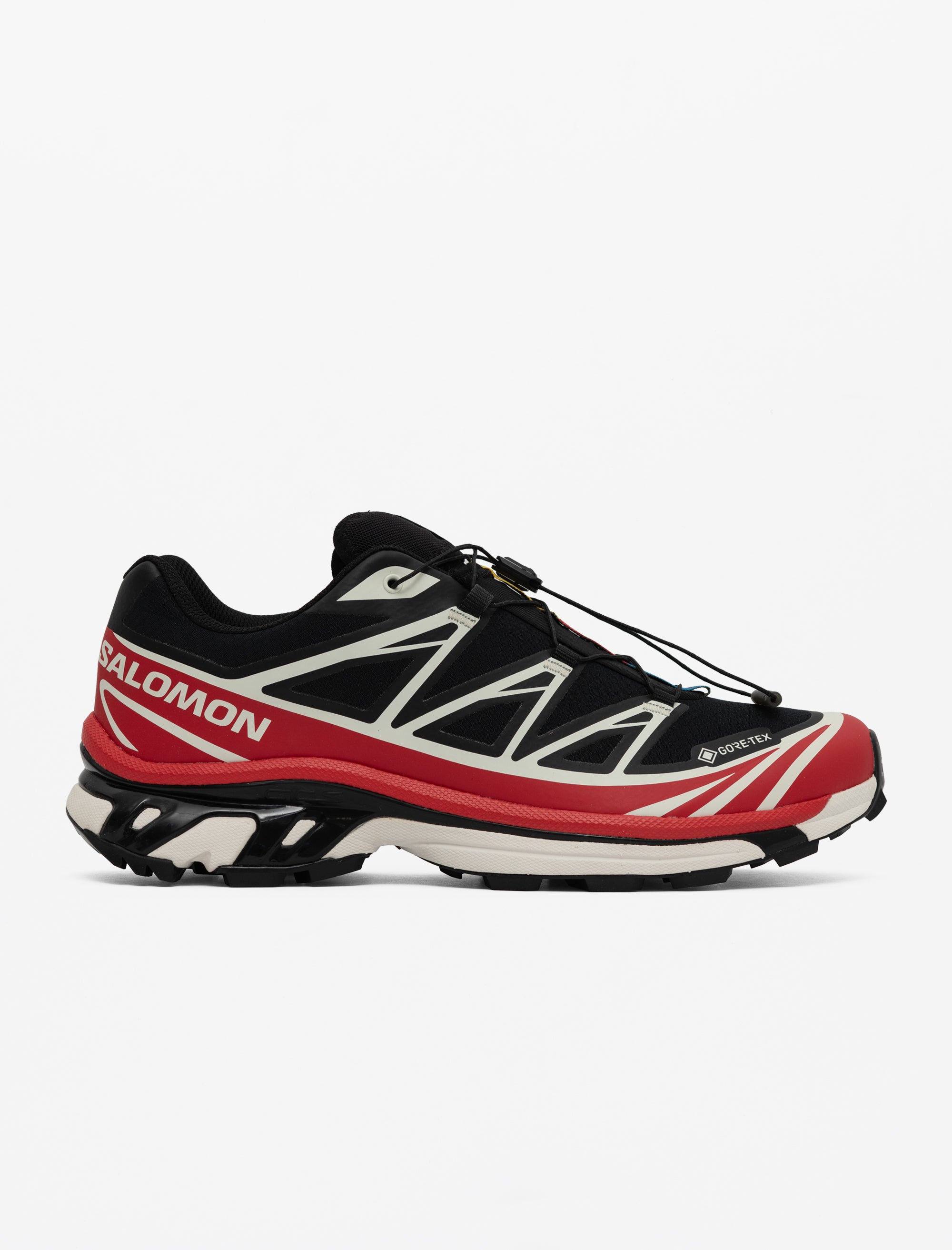 Black and red running shoe with visible brand logo on a white background